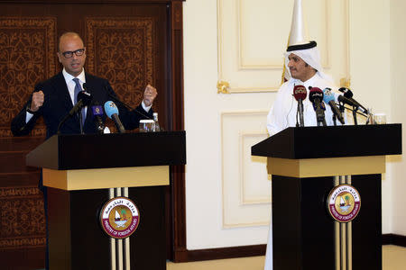 Italian foreign minister Angelino Alfano and Qatar's foreign minister Sheikh Mohammed bin Abdulrahman al-Thani attend a joint news conference in Doha, Qatar, August 2, 2017. REUTERS/Naseem Zeitoon