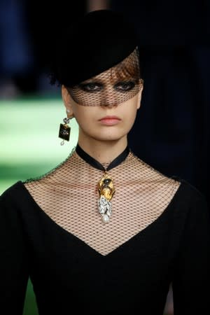 A model presents a creation by designer Maria Grazia Chiuri as part of her Haute Couture Fall/Winter 2019/20 collection show for fashion house Dior in Paris