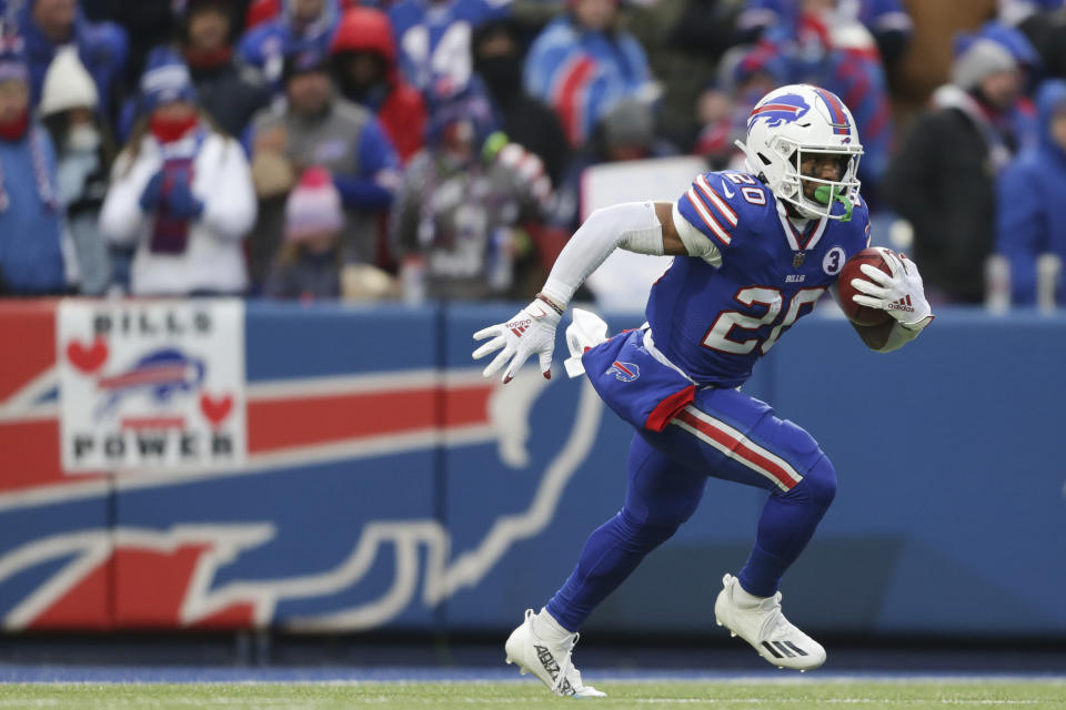 FILE - Buffalo Bills running back Nyheim Hines (20) returns a kick off for a touchdown during the second half of an NFL football game against the New England Patriots, Sunday, Jan. 8, 2023, in Orchard Park, N.Y. Hines sustained a knee injury in a jet skiing accident and will miss the season, a person with knowledge of the situation told The Associated Press on Monday, July 24, 2023.(AP Photo/Joshua Bessex, File)