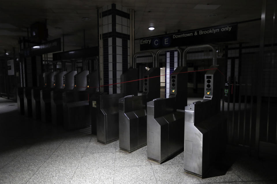 A subway station is in the dark during a widespread power outage, Saturday, July 13, 2019, in New York. Authorities were scrambling to restore electricity to Manhattan following a power outage that knocked out Times Square's towering electronic screens, darkened marquees in the theater district and left businesses without electricity, elevators stuck and subway cars stalled. (AP Photo/Michael Owens)