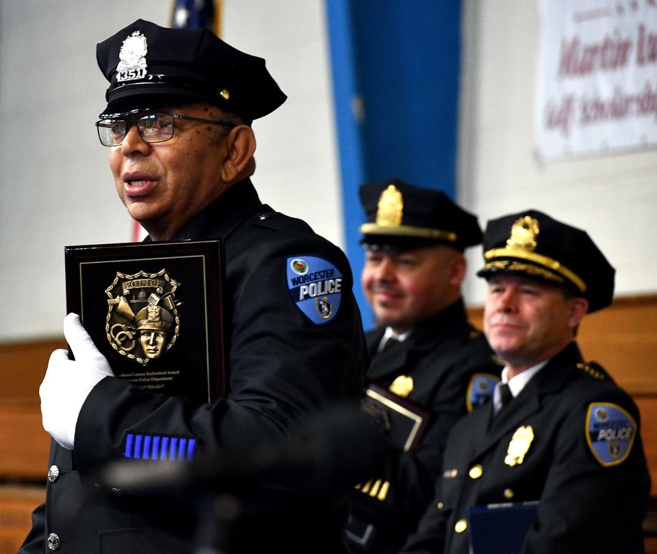 Worcester Police Department service award recipient Officer David Rutherford speaks Monday during the Martin Luther King, Jr. Community Breakfast at Quinsigamond Community College.