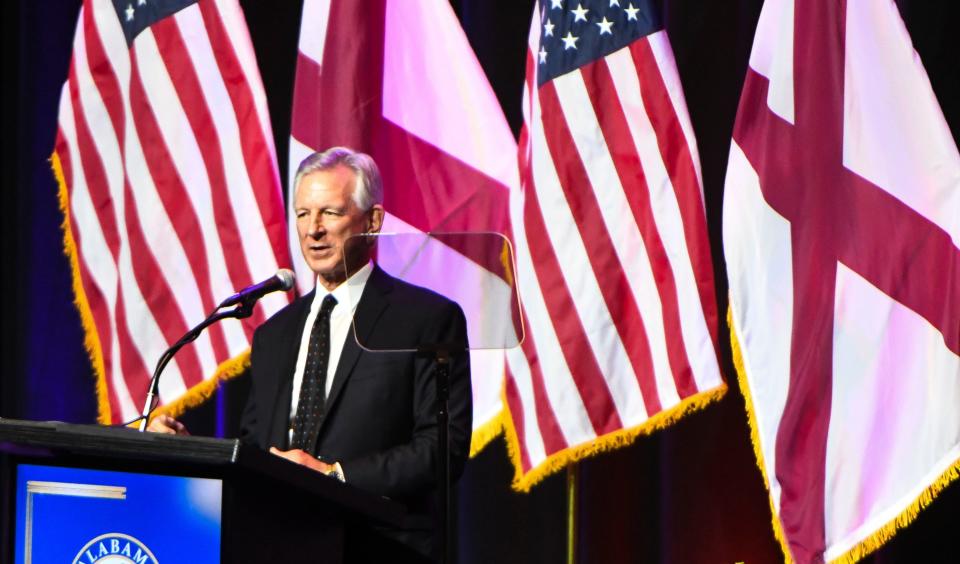U.S. Sen. Tommy Tuberville introduces former President Donald Trump before he speaks during the Alabama Republican Party Summer Dinner at the Renaissance Hotel and Conference Center in Montgomery on Friday, August 4, 2023.