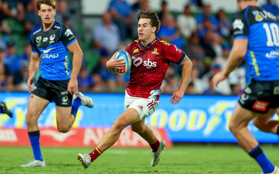 Connor Garden-Bachop of the Highlanders runs at the defence during the Super Rugby Pacific against he Western Force in Perth, Australia, April 22, 2023