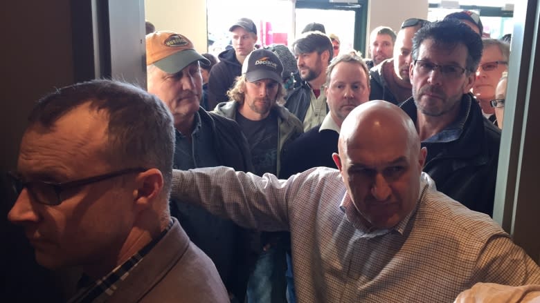 Bill 6 town hall draws overflow crowd of angry Alberta farmers in Red Deer