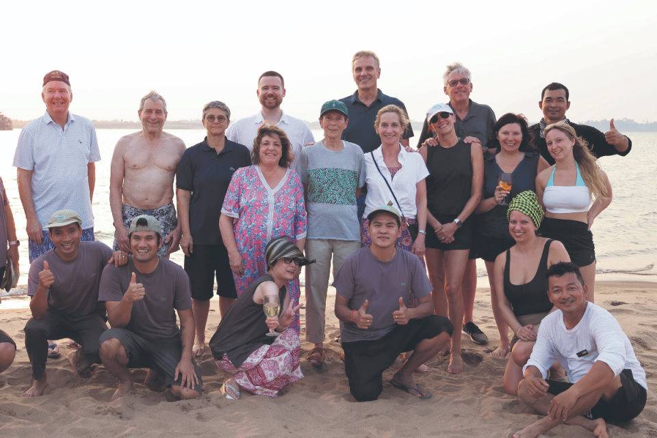 Alexandra, with green krama head scarf, and other Aqua guests and locals