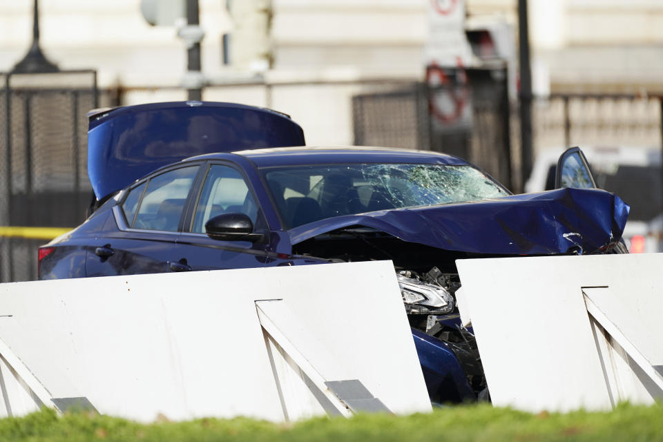 The car that crashed into a barrier on Capitol Hill is seen near the Senate side of the U.S. Capitol in Washington, Friday, April 2, 2021. (AP Photo/Carolyn Kaster)