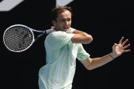Daniil Medvedev of Russia plays a forehand return to Henri Laaksonen of Switzerland during their first round match at the Australian Open tennis championships in Melbourne, Australia, Tuesday, Jan. 18, 2022. (AP Photo/Hamish Blair)