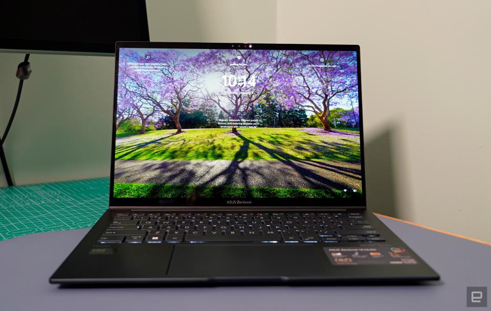 <p>ASUS ZenBook 14 OLED front view showing the Windows 11 login screen.</p>
