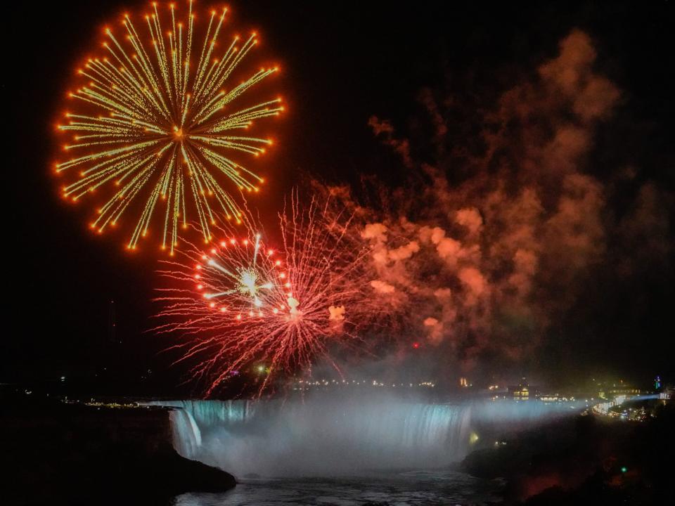 Views from the Sheraton Fallsview hotel room window at night with fireworks