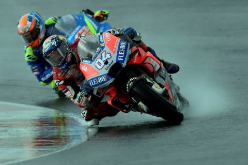 Andrea Dovizioso and Alex Rins in the rain at Valencia