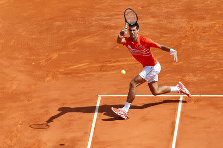 Tennis - ATP 1000 - Monte Carlo Masters - Monte-Carlo Country Club, Roquebrune-Cap-Martin, France - April 19, 2019 Serbia's Novak Djokovic in action during his quarter final match against Russia's Daniil Medvedev REUTERS/Eric Gaillard