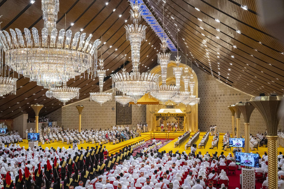 This picture taken by Brunei's Information Department on Jan. 10, 2024 shows the royal powdering ceremony for Brunei's Prince Abdul Mateen's, center, at Istana Nurul Iman, ahead of his wedding with Anisha Rosnah, in Bandar Seri Begawan, Brunei. (Brunei's Information Department via AP)