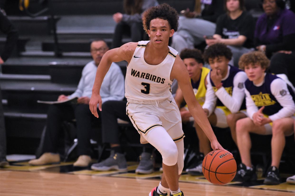 Abilene High's Hayden Williams (3) drives towards the basket during Tuesday's game against Midland High at Eagle Gym on Jan. 11, 2022. The Eagles earned their first District 2-6A victory 65-40.