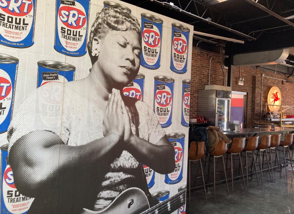 A mural of Sister Rosetta Thorpe, known as the godmother of rock 'n' roll, at The Eagle's Dare bar and beer garden at 420 N 3rd St. Wilmington, N.C. ALLISON BALLARD/STARNEWS