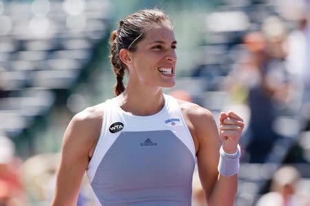 Andrea Petkovic celebrates after her match against Karolina Pliskova (not pictured) on day nine of the Miami Open at Crandon Park Tennis Center. Petkovic won 6-4, 6-2. Mandatory Credit: Geoff Burke-USA TODAY Sports