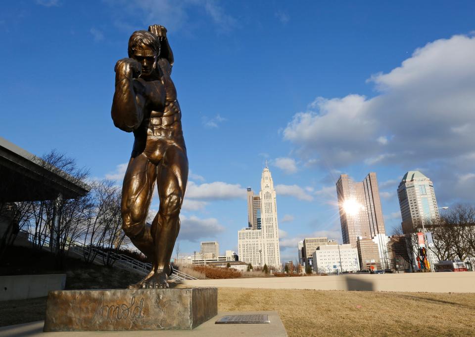 A statue of Arnold Schwarzenegger stands outside Veterans Memorial on Feb. 27, 2014. It later was moved to the Greater Columbus Convention Center.