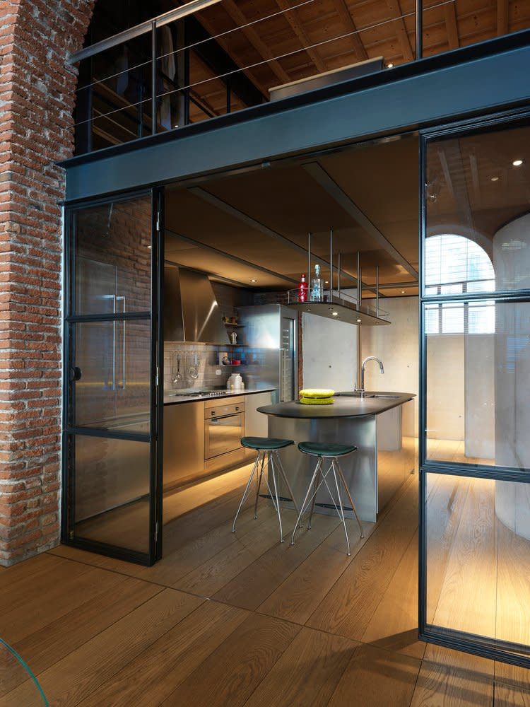 Converted Milan garage kitchen and dining area