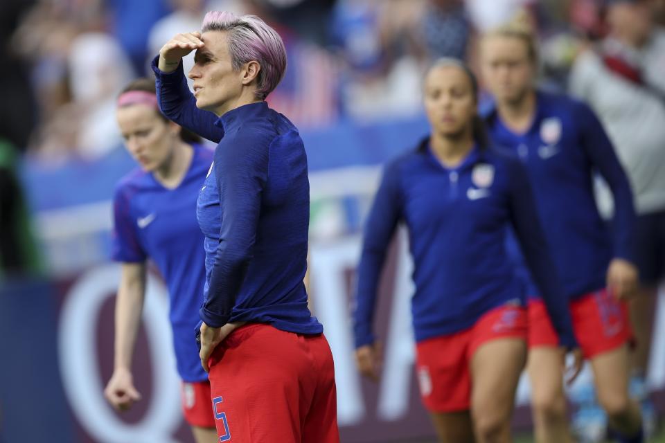 United States' Megan Rapinoe warms up before the Women's World Cup semifinal soccer match between England and the United States, at the Stade de Lyon outside Lyon, France, Tuesday, July 2, 2019. (AP Photo/Francisco Seco)