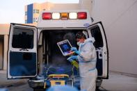 EMT’s clean their materials at Memorial West in Pembroke Pines