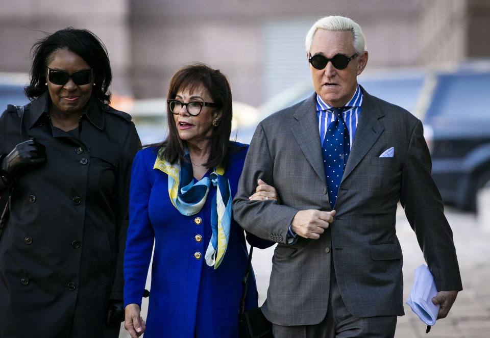 Roger Stone, and his wife Nydia, arrive at Federal Court for his federal trial in Washington, Friday, Nov. 8, 2019. (AP Photo/Al Drago)