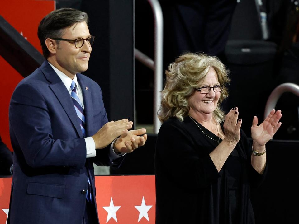 Vance's mother beside Speaker Mike Johnson at the Republican National Convention on Wednesday.