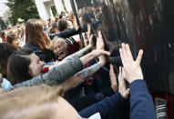 Women block a police bus during an opposition rally to protest the official presidential election results in Minsk, Belarus, Saturday, Sept. 12, 2020. (Tut.by via AP)