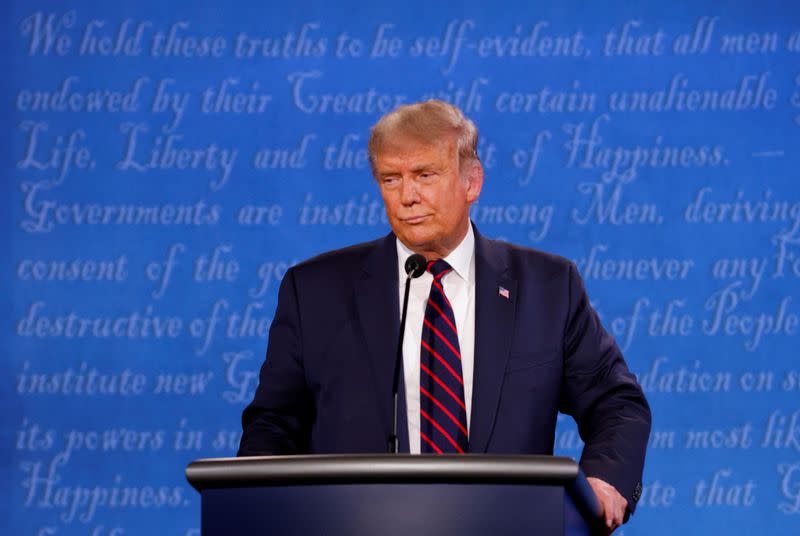 U.S. President Donald Trump and Democratic presidential nominee Joe Biden participate in their first 2020 presidential campaign debate in Cleveland