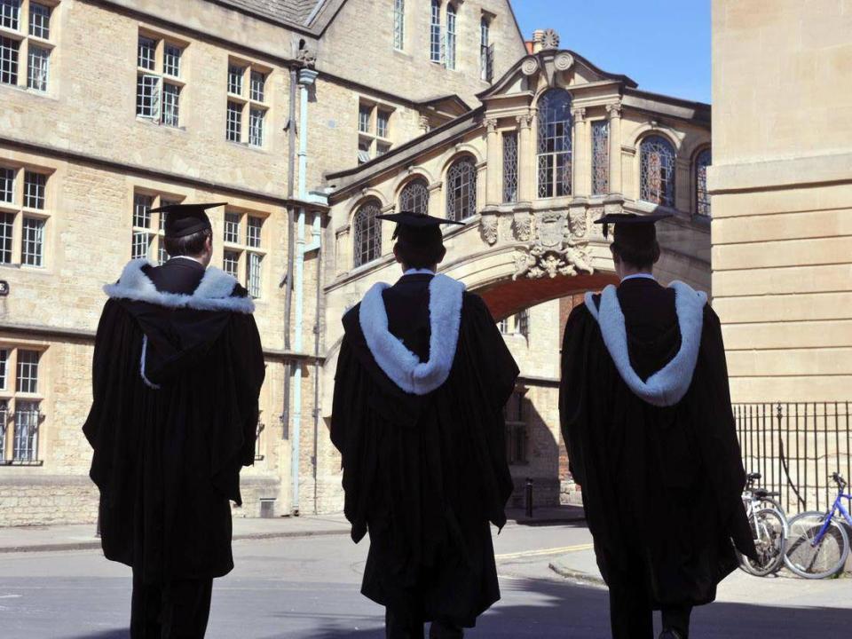 Students find out whether they have got their university places on A-level results day: Getty