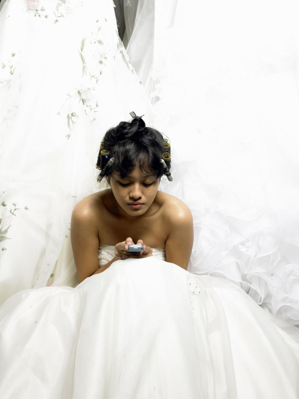 You text the bride or groom on their wedding day.