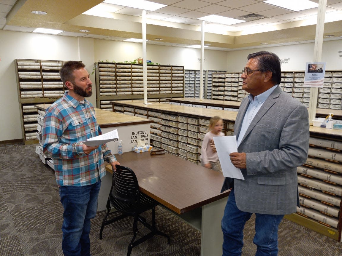 Ward 2 Carlsbad City Council candidate Jeff Forrest (left) and Ward 1 incumbent Edward Rodriguez wait for election results Nov. 2, 2021 at the Eddy County Clerk's office in Carlsbad.