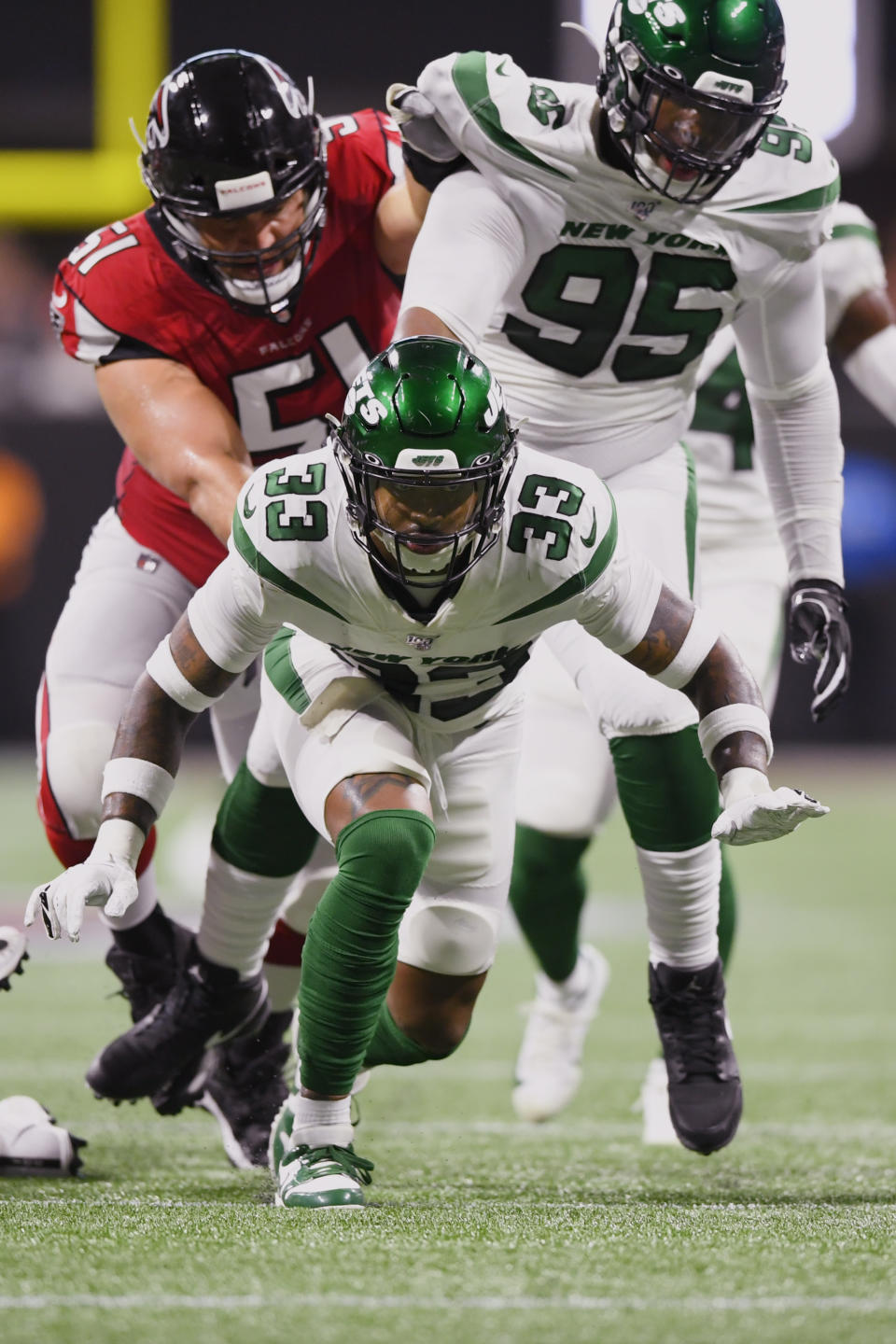 New York Jets strong safety Jamal Adams (33) celebrates sacking Atlanta Falcons quarterback Matt Ryan (2) during the first half an NFL preseason football game, Thursday, Aug. 15, 2019, in Atlanta. (AP Photo/John Amis)