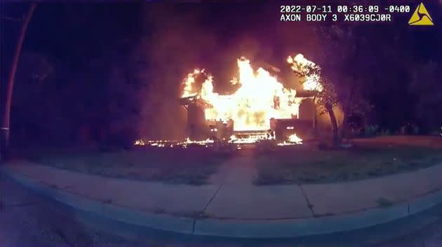 An image of the burning home just before Nicholas Bostic raced out carrying a 6-year-old girl. (Photo: Lafayette Police Department)