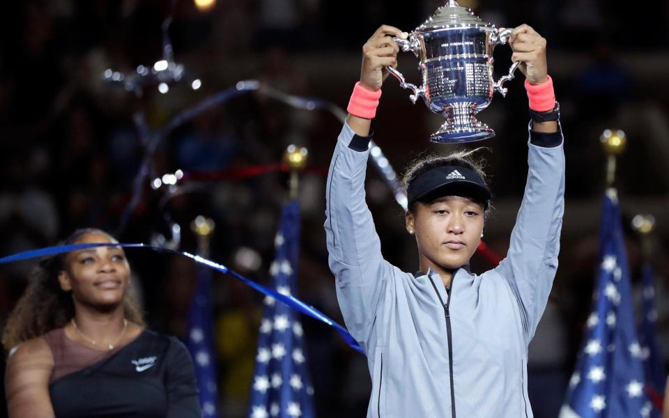 No smile: Osaka did not look too happy about her victory - AP