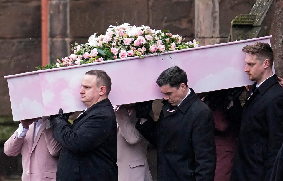 The coffin of Brianna Ghey is carried from St. Elphin's Church in Warrington, United Kingdom, on March 15, 2023.