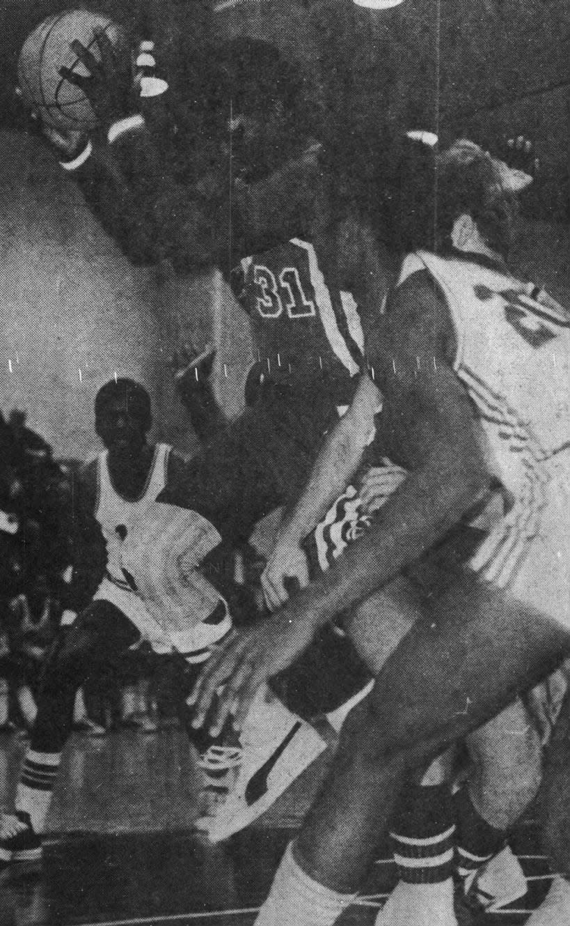 Greg McAllister takes charge for Scotch Plains as he grabs rebound at Plainfield. Raiders took charge of the game to win the opener.