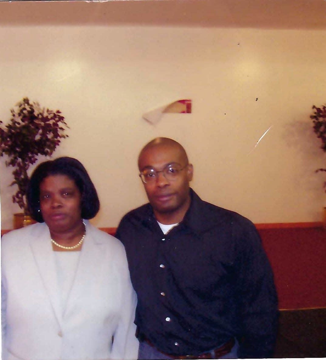 Denise Holcomb, left, and her son, Derrick Cummings, in 2002. Derrick died by suicide on Aug. 8, 2003, less than three weeks shy of his 31st birthday.