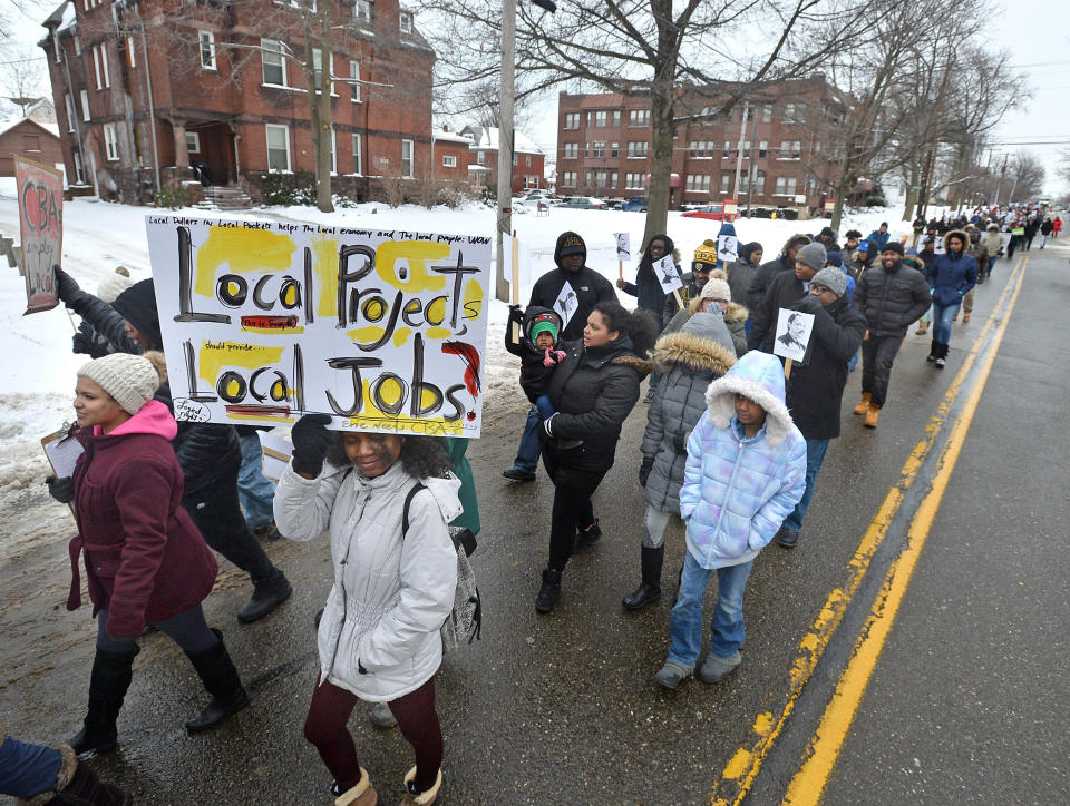 Activists hold Martin Luther King Day marches