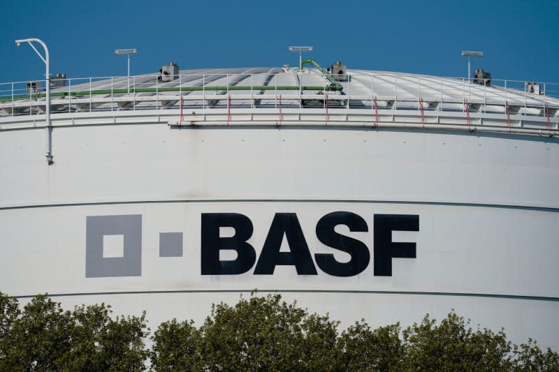 A logo of the chemical company BASF is seen on a large storage container at the main plant. Uwe Anspach/Deutsche Presse-Agentur GmbH/dpa