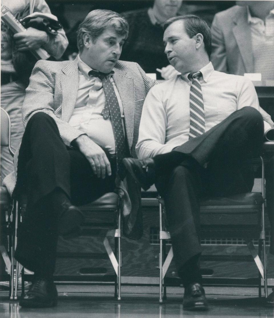 Then-Indiana coach Bobby Knight enjoys a quiet moment with Ohio State's Eldon Miller.