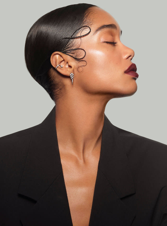 <p>Bottega Veneta jacket. Repossi ear cuff. Statement Paris<b> </b>earring. Photo: Phil Poynter</p>