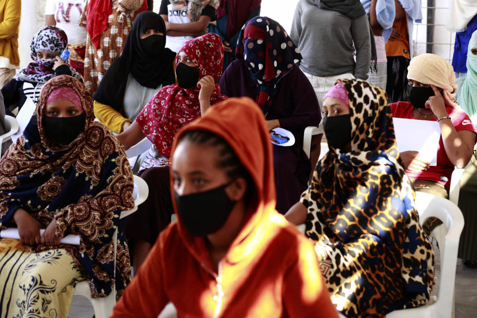 A vaccination campaign against the coronavirus is underway at a Tripoli shelter for migrants, organized jointly by the Libyan center for disease control and the International Organization for Migration. in Tripoli, Libya, Wednesday Oct. 6, 2021. (AP Photo/Yousef Murad)