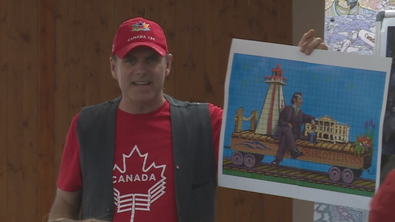 Islanders contribute to a mural mosaic marking Canada's 150th