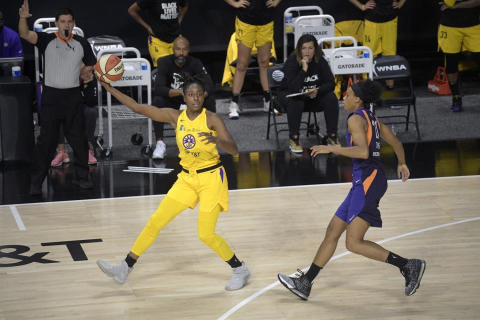 Sparks forward Nneka Ogwumike gathers a pass.