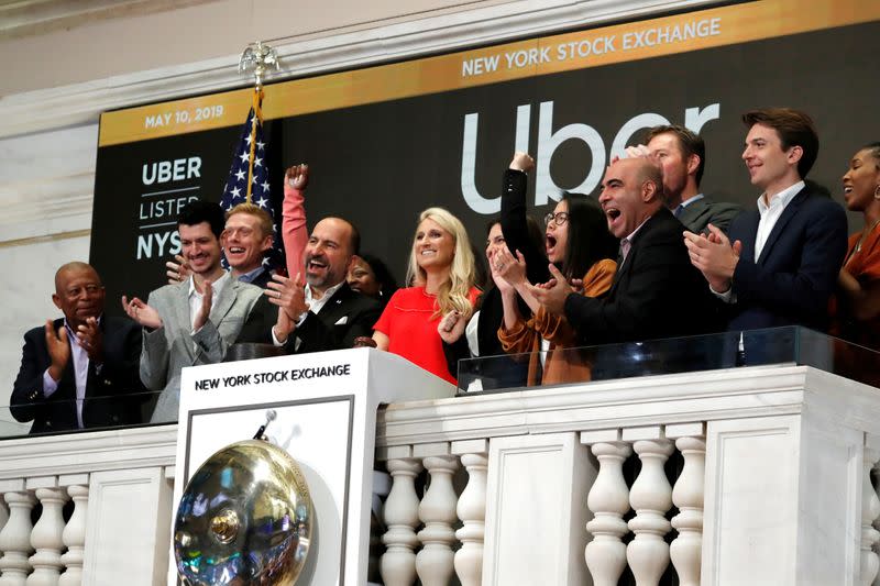 FILE PHOTO: Uber Technologies Inc. CEO Dara Khosrowshahi rings opening bell on NYSE during the company's IPO in New York