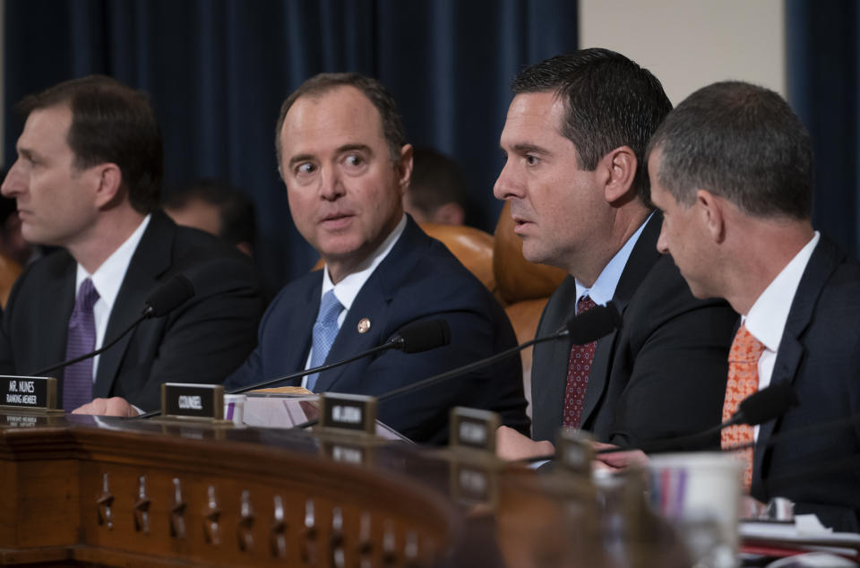 House Intelligence Committee Chairman Adam Schiff, D-Calif., center left, turns to Rep. Devin Nunes, R-Calif., the ranking member, during a disagreement over procedure as they question former U.S. Ambassador to Ukraine Marie Yovanovitch, Nov. 15, on Capitol Hill in Washington. (Photo: J. Scott Applewhite/AP)                                                                                                                                                                                                                                                                                                                                                                                                                                                                                                                   