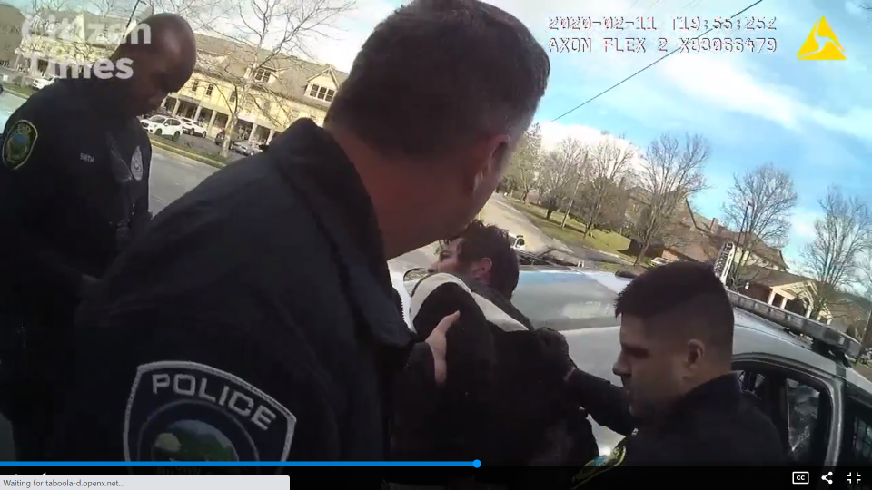 Anthony Sorangelo, right, and other police officers from Asheville and Biltmore Forest arrest a man on the side of U.S. 25 on Feb. 11, 2020. Sorangelo was later charged for punching the man, though the case was dismissed.