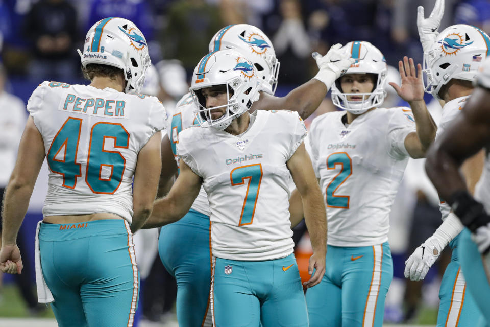 Miami Dolphins kicker Jason Sanders (7) is congratulated after hitting a field goal against the Indianapolis Colts during the second half of an NFL football game in Indianapolis, Sunday, Nov. 10, 2019. (AP Photo/Darron Cummings)