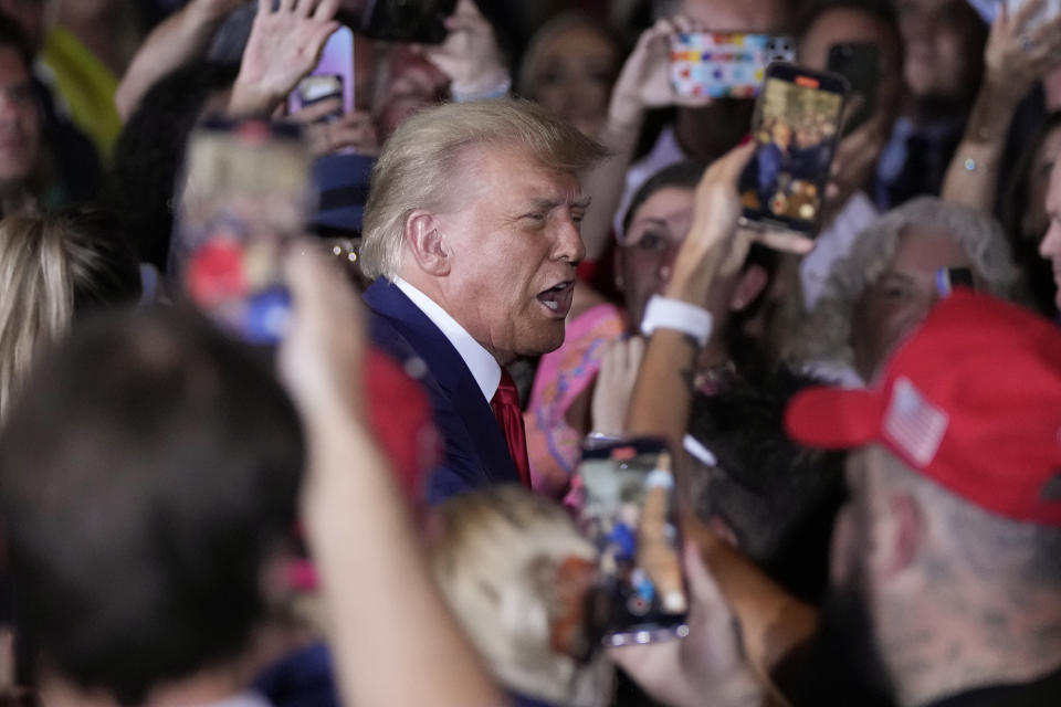 Former President Donald Trump arrives to speak at his Mar-a-Lago estate hours after being arraigned in New York City, Tuesday, April 4, 2023, in Palm Beach, Fla. (AP Photo/Rebecca Blackwell)