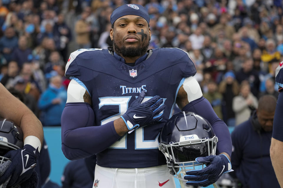 FILE -Tennessee Titans running back Derrick Henry stands for the national anthem before an NFL football game against the Jacksonville Jaguars, Sunday, Jan. 7, 2024, in Nashville, Tenn. Derrick Henry is back in the gym, eager to prove turning 30 is just a number that shouldn’t affect the four-time Pro Bowl running back’s value on the NFL's open market.(AP Photo/George Walker IV, File)