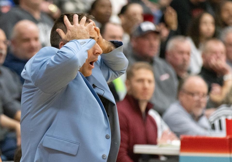 Louisville head coach reacts to a foul call against his team in a district final against GlenOak on Saturday, March 9, 2024, at Alliance.